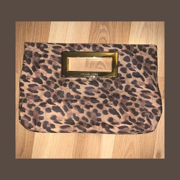 Michael Kors Handbags - MICHAEL KORS Leopard Print Clutch MICHAEL KORS Leopard Print Clutch Mich…